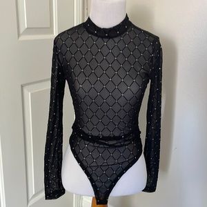 Black sheer long sleeve body suit.